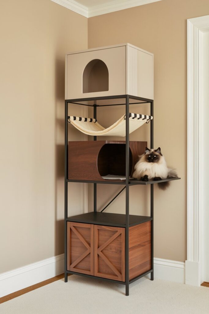 Space‑saving multi‑level cat tree for large cats, matte‑black steel frame and walnut wood, ragdoll cat lounging on top tier—Instagram‑worthy pet décor.